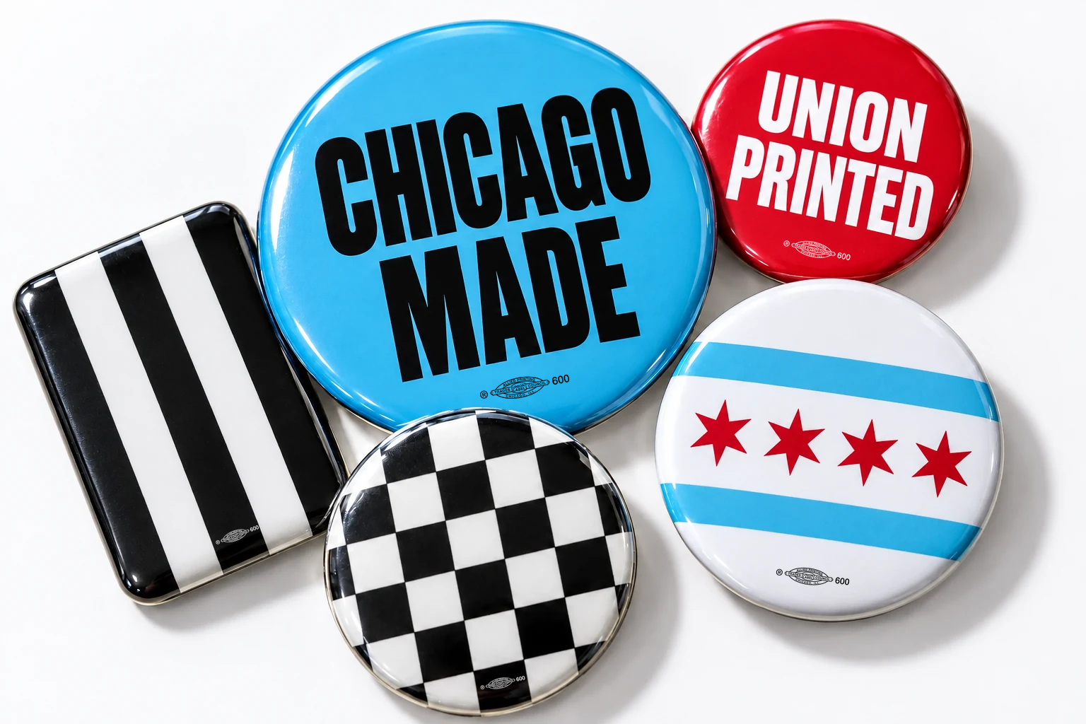 Illustrative Chicago and union themed pinback button designs in sky blue, red, black, and white